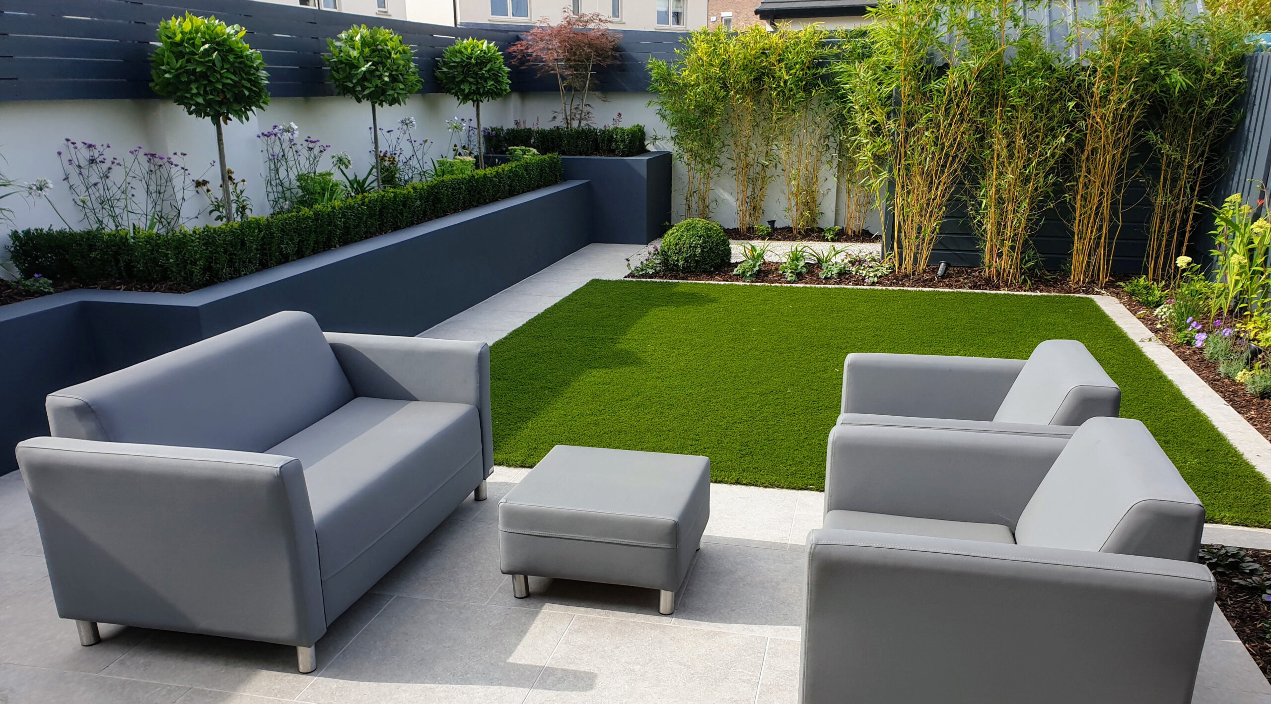 Artifical grass is a low-maintenace choice in smaller gardens